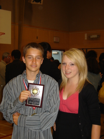 Son Ty's grad with sis Tamara & student award