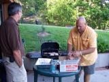 Lee cooking burgers for fly fishing club