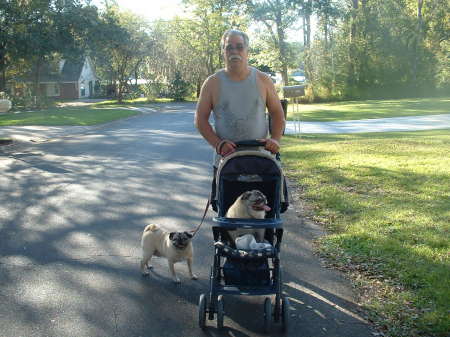 My husband, Ron walking our dog!!