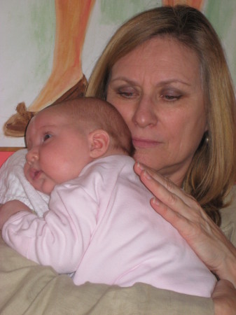 Granddaughter,Maddy, me after her baptism 2009