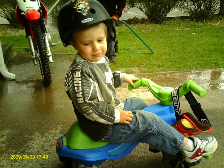 my grandson Jason, riding his bike :)