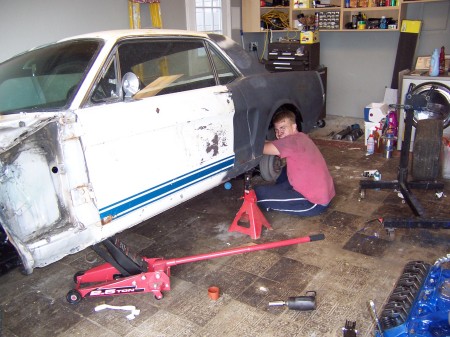 My son Keith working on my Mustang