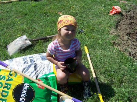 Tootie gardening with her mommy.