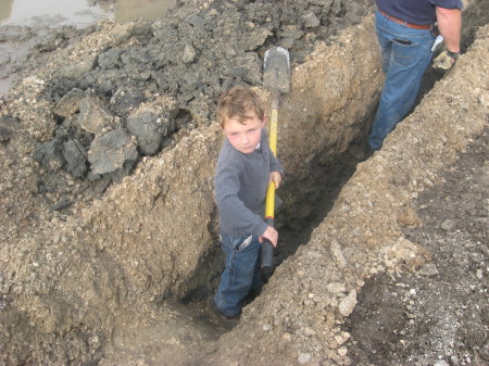 Tyler digging for pipe