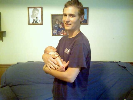 my mddle son shane holding his nephew