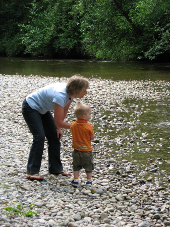 me throwing rocks with grandson Ethan