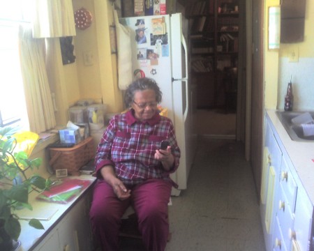 My Mother - 92 yrs old...Checking out her Cell