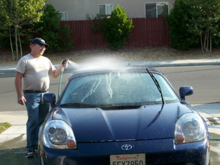 Tom washing car