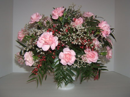 Pink carnations and pepperberries