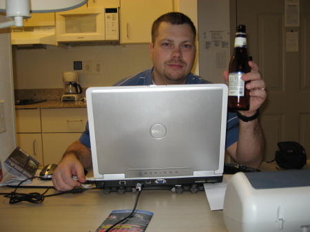 Working from the Hotel Room/Enjoying a beer.