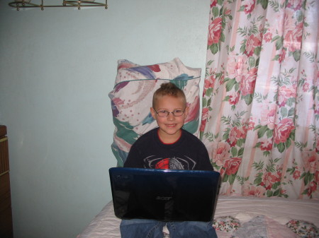 Ethan on his laptop