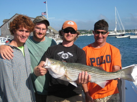 Peter & Nephews hauling in dinner on M.V.