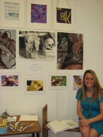 Sarah and some of her art