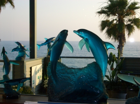 Pacific Ocean Through Sculptures of Dolphins