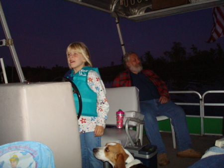 Maylee driving the boat