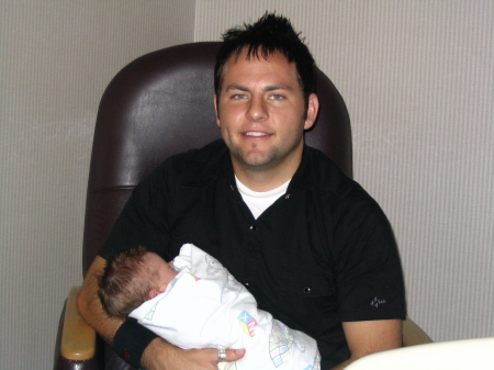 My son Brett holding his new nephew Daxton