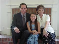 Family Photo in Front of Fireplace at Home