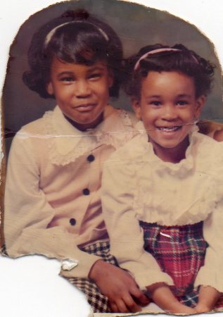 my sister April and I at 7 and 5 years old