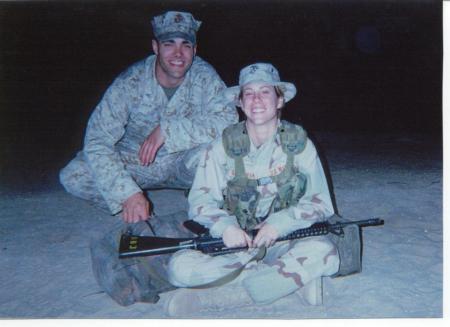 Daughter and her husband w/ her M16 in Kuwait