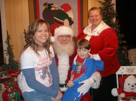 Kelly, Trey, Santa and Mrs Claus