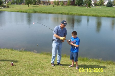 Collin and Dad fishing in our pond