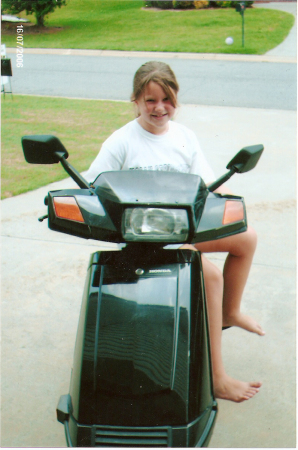 MY GRANDDAUGHTER KAYLAH ON THE "VESPA"