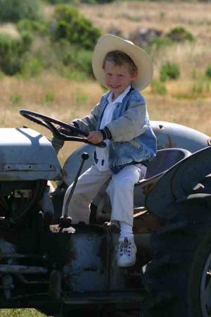 Zach on Tractor 2004