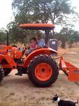 David and Mary working the tractor