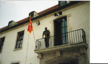 Al looks over HQ balcony in Germany