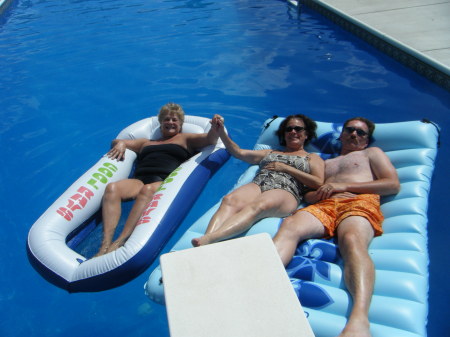 Me, Dawn and husband Carl in her pool