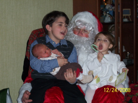 My three Grand Children with Santa.