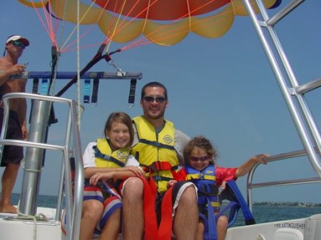 Parasailing-My son John with my granddaughters