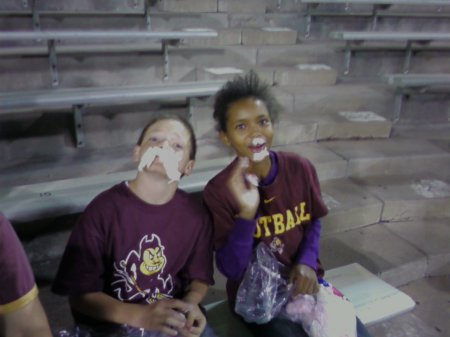 Youngest and her friend at ASU football game