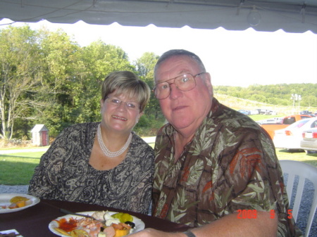 Carol and Dennis at a wedding