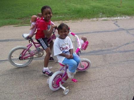 Kayla and Kira on bikes