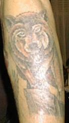 Wolf tat left arm