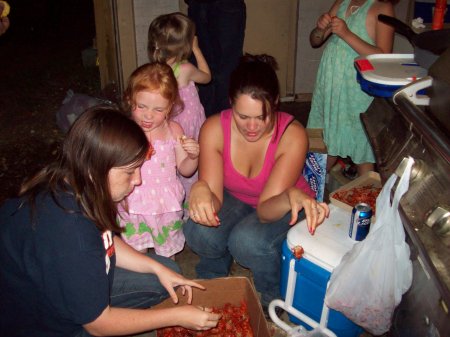 My daughter and Lynn eating crawfish