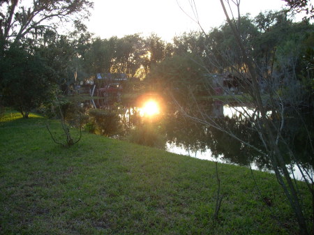 SUNSET IN POND OUT BACK.