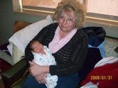 Me holding my youngest Grandchild