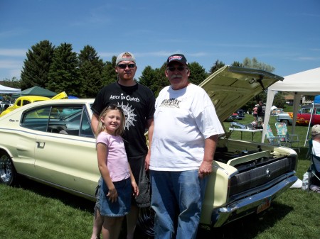 My 66 charger and oldest son and grandoughter