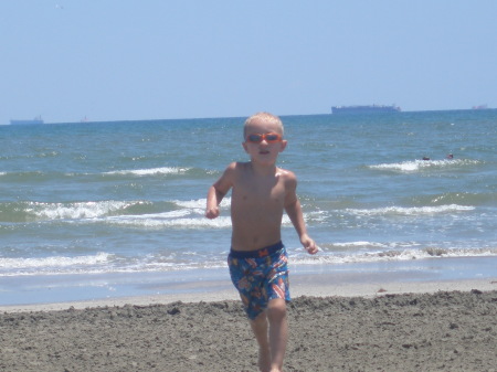 Grant on the beach in Galveston....