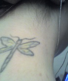 Dragonfly Tat on back of my neck