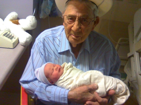 Ellie, 6 hrs. old, with her Great Grandpa 9/09