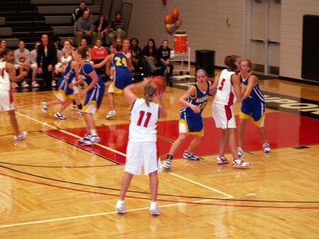 Sara playing basketball for Davenport