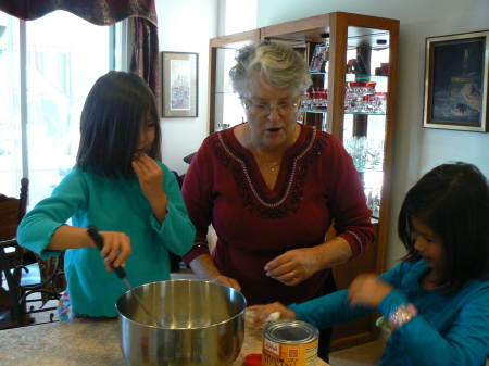 Me and my girls making a pumpkin pie