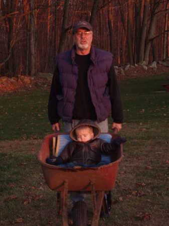 Grandpa pushes Shaun in wheelbarrow