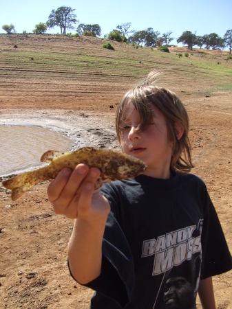 My youngest son and his first fish