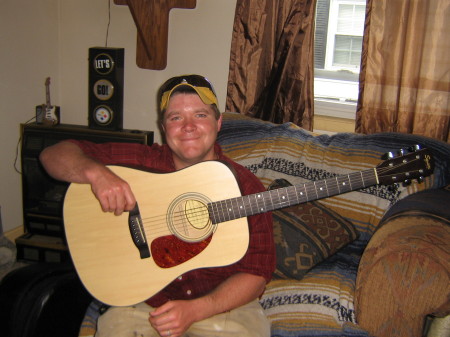 My son Nathan learning guitar