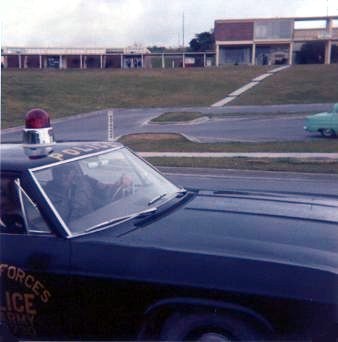 my cop car in front of headquaters Bldg 425