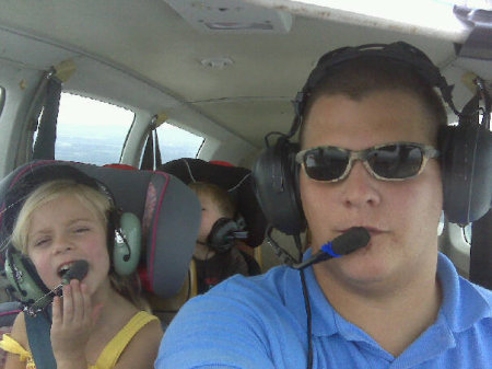 Andrew flying with KK and Noah